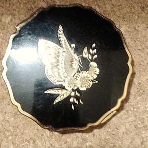 Vintage Stratton compact. Gold tone and enamel black with butterfly and flowers